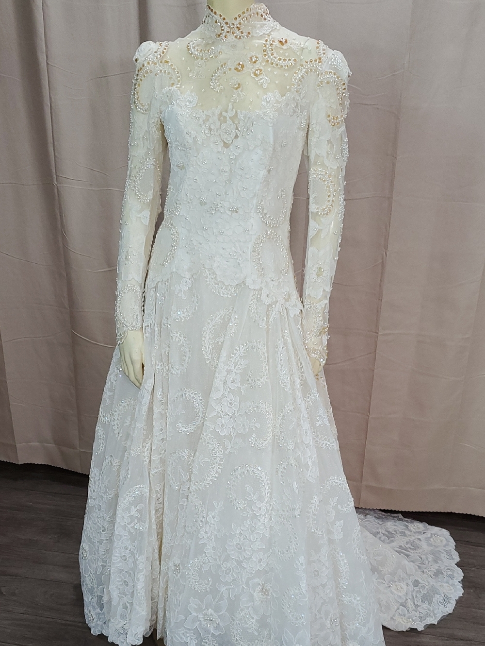 Ivory Long-Sleeve Lace Bridal Gown with High Neck